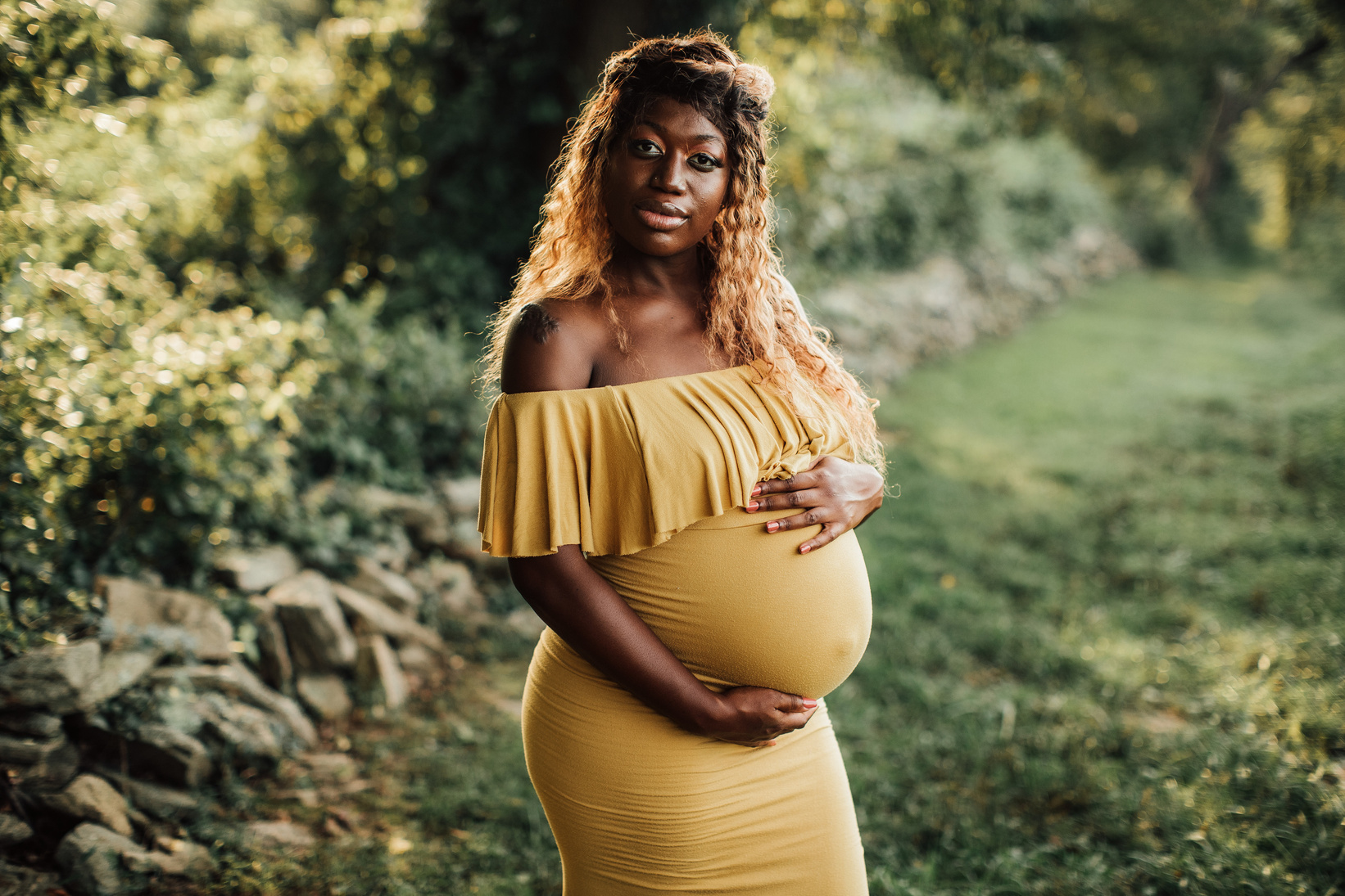 Portrait of a Pregnant Woman Outdoors
